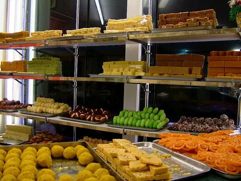 Trays of fresh mithai on the counter